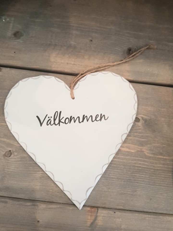 Välkommen skylt